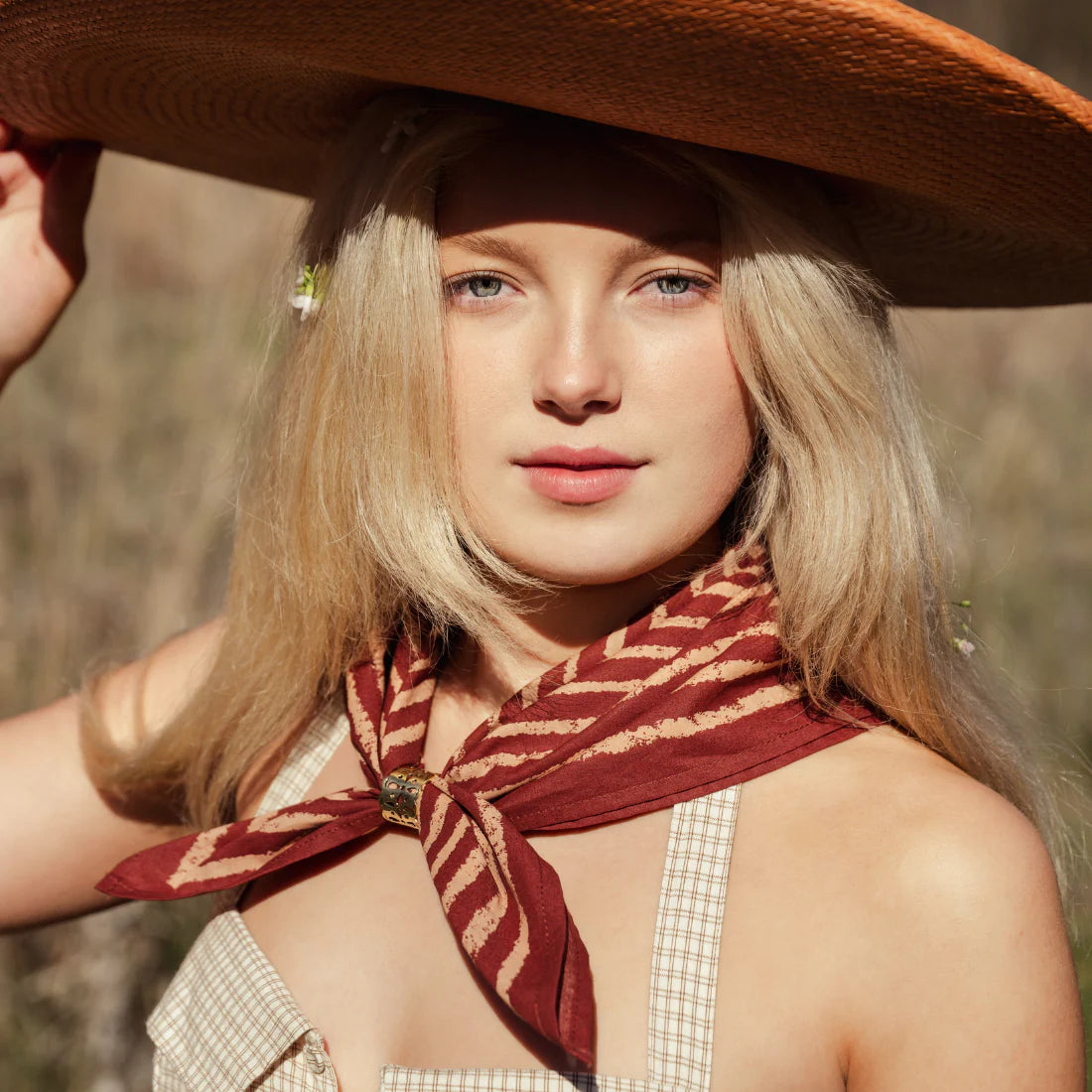 Model wearing a the bandana as a neckerchief.