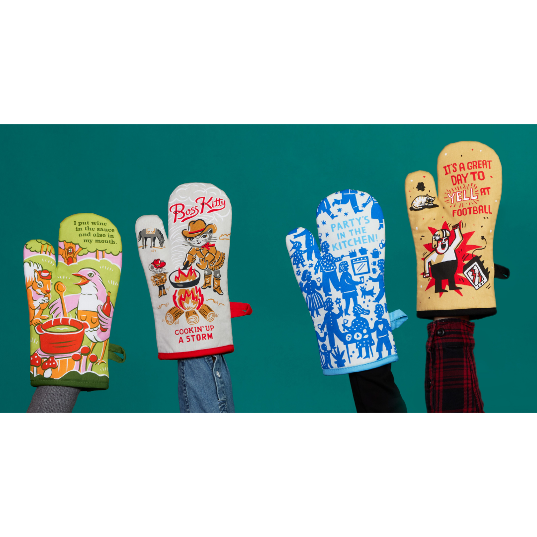 4 hands protected from heat with oven mitts