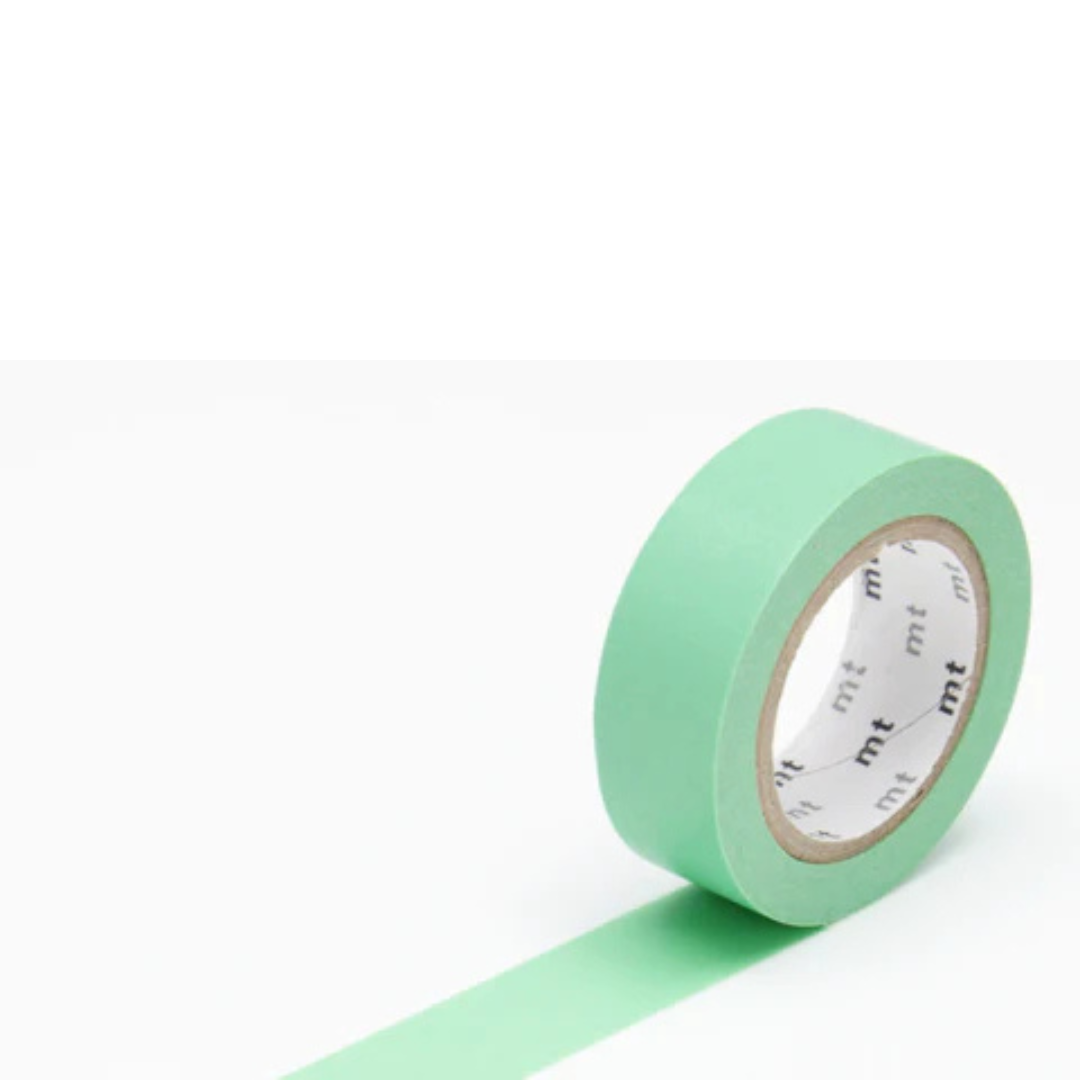 Bright green roll of masking tape against a white background.