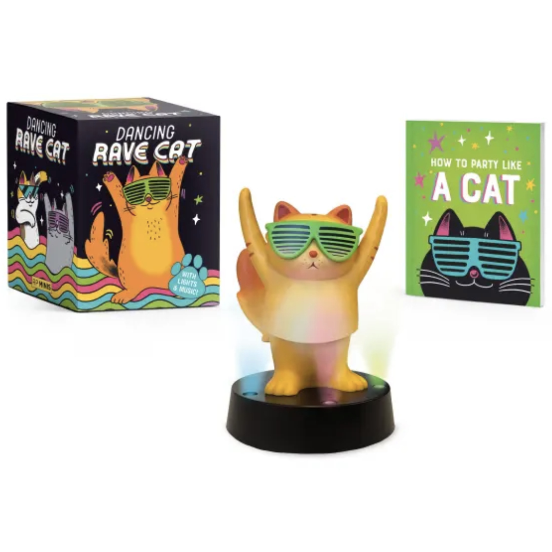 Colorful cat figurine with sunglasses, packaging, and book titled 'How to Party Like a Cat'