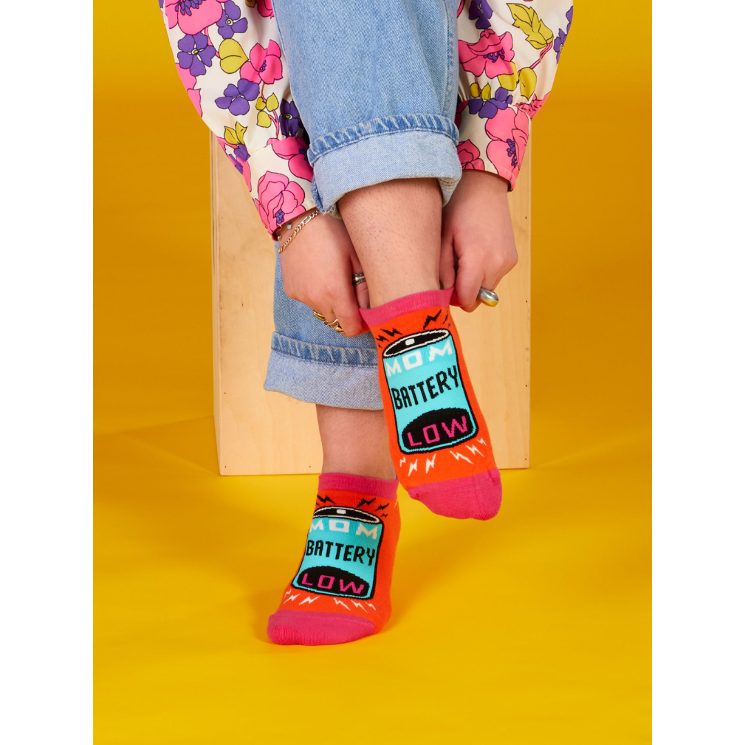 Mom wearing her mom battery low socks