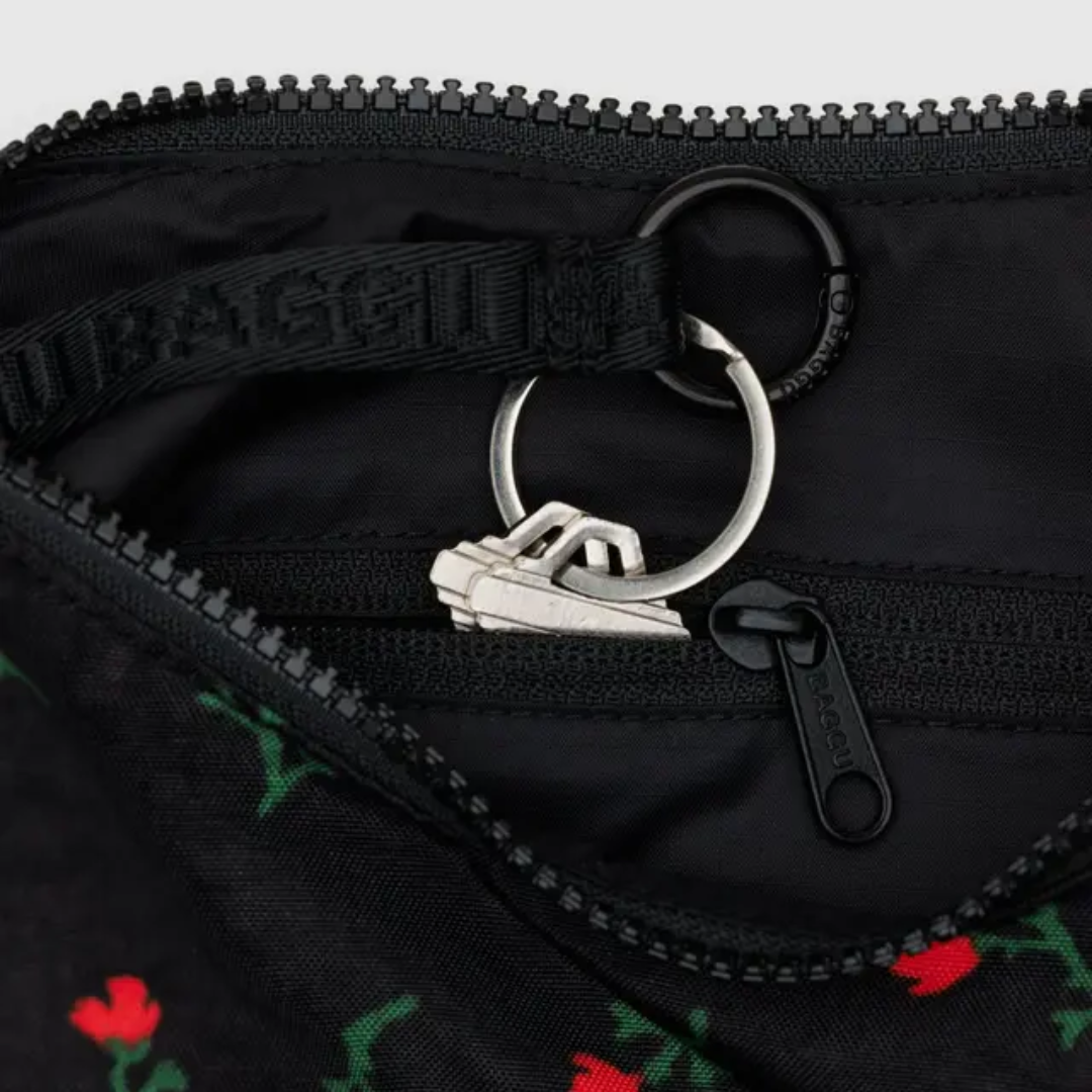 internal detail of the key strap and inside zippered pocket
