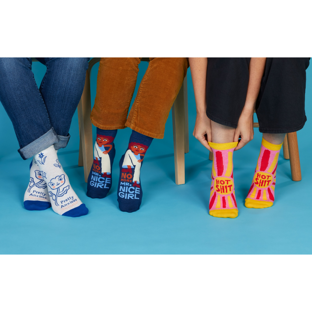 3 folks in cute socks thinking about world domination and socks.