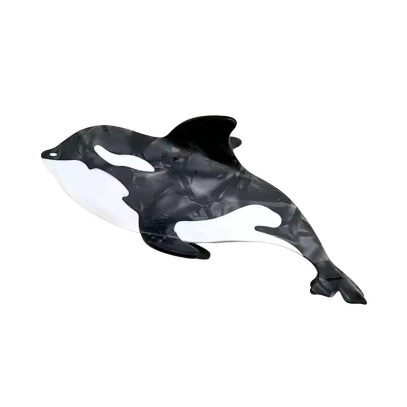 Orca shaped claw hair clip in black and white pearlescent plastic