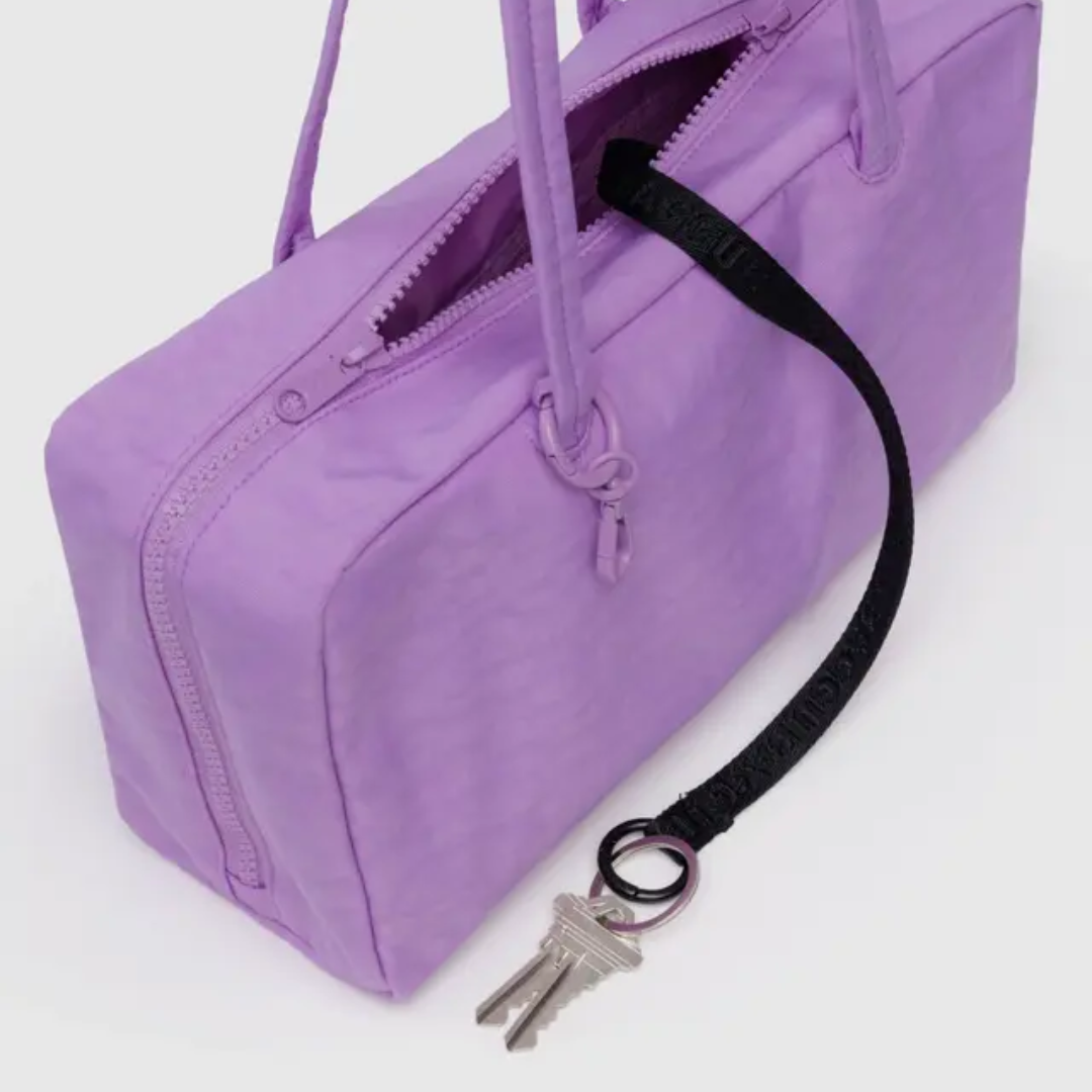 Detail of the key strap in the Baggu bowler bag