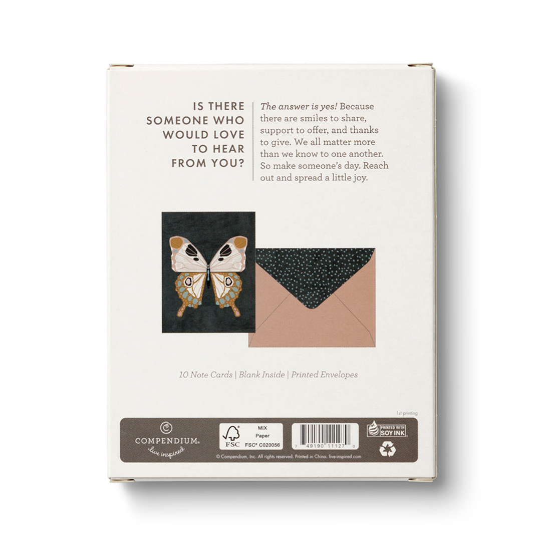 Back of the box of cards show an illustration of the card and envelope and says "Is there someone who would love to hear from you? The answer is yes! Because there are smiles to share, support to offer, and thanks to give. We all matter more than we know to one another. So make someone's day. Reach out and spread a little joy."