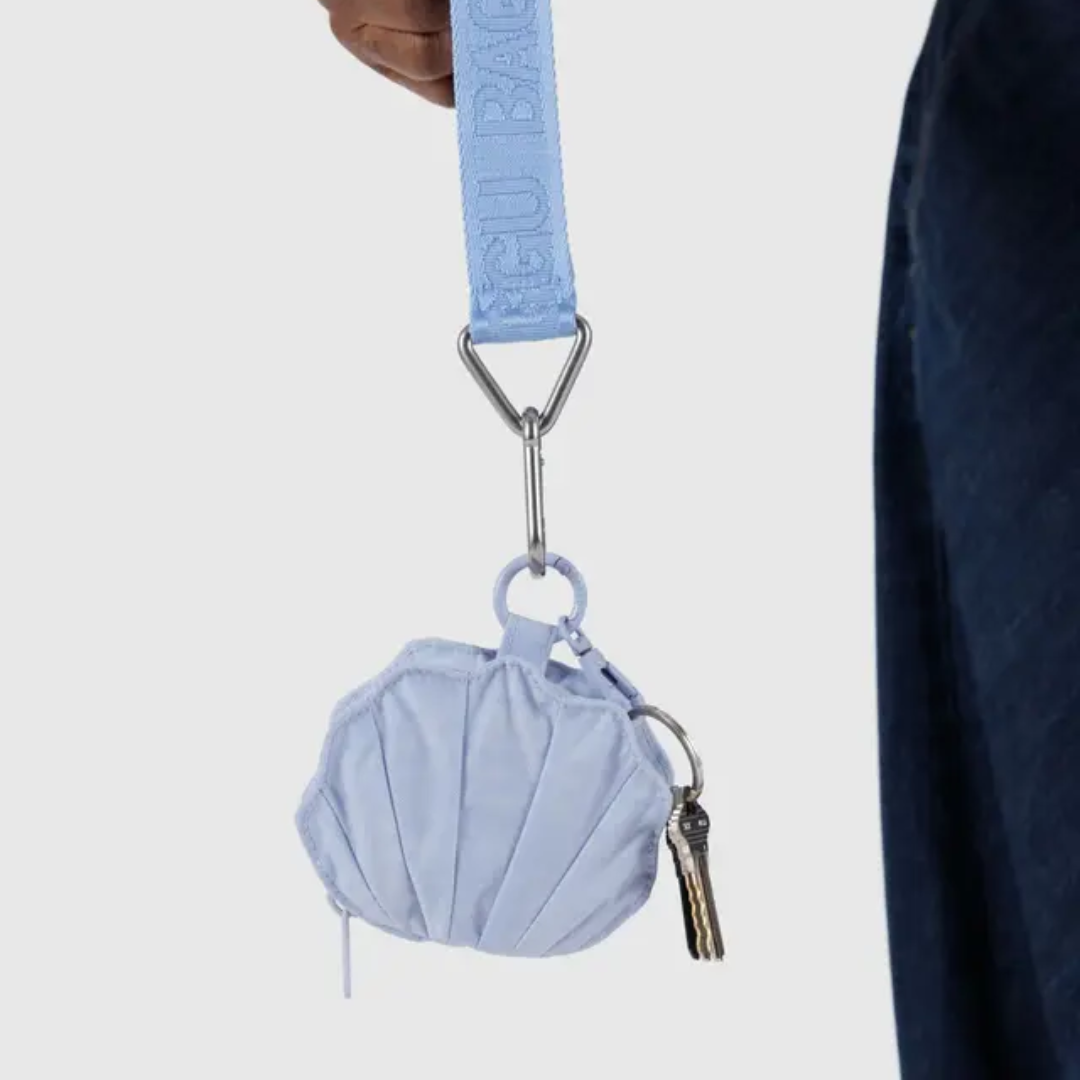 Coin purse with keys hanging from a Baggu key loop