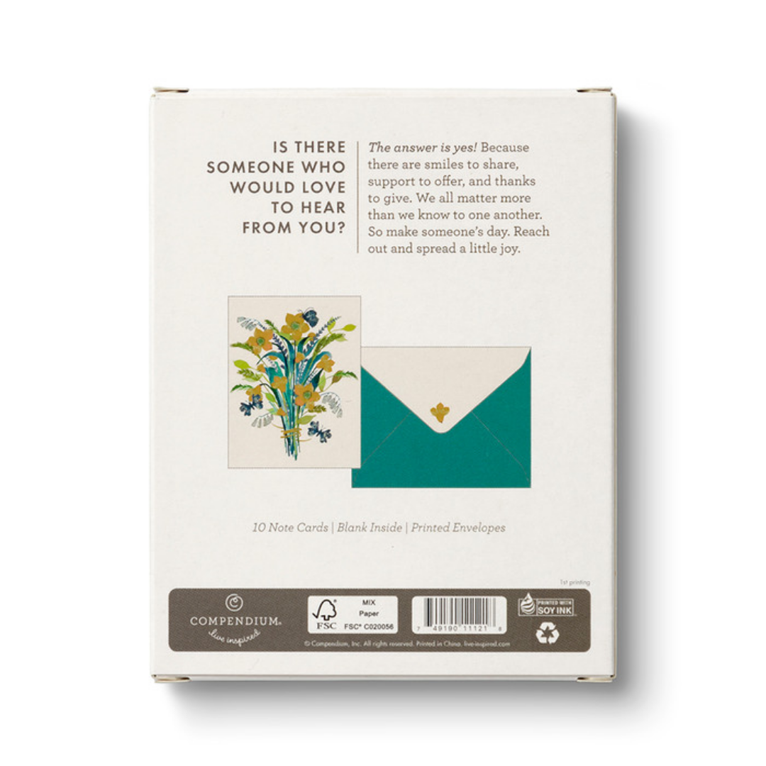 Back of the box of cards show an illustration of the card and envelope and says "Is there someone who would love to hear from you? The answer is yes! Because there are smiles to share, support to offer, and thanks to give. We all matter more than we know to one another. So make someone's day. Reach out and spread a little joy."