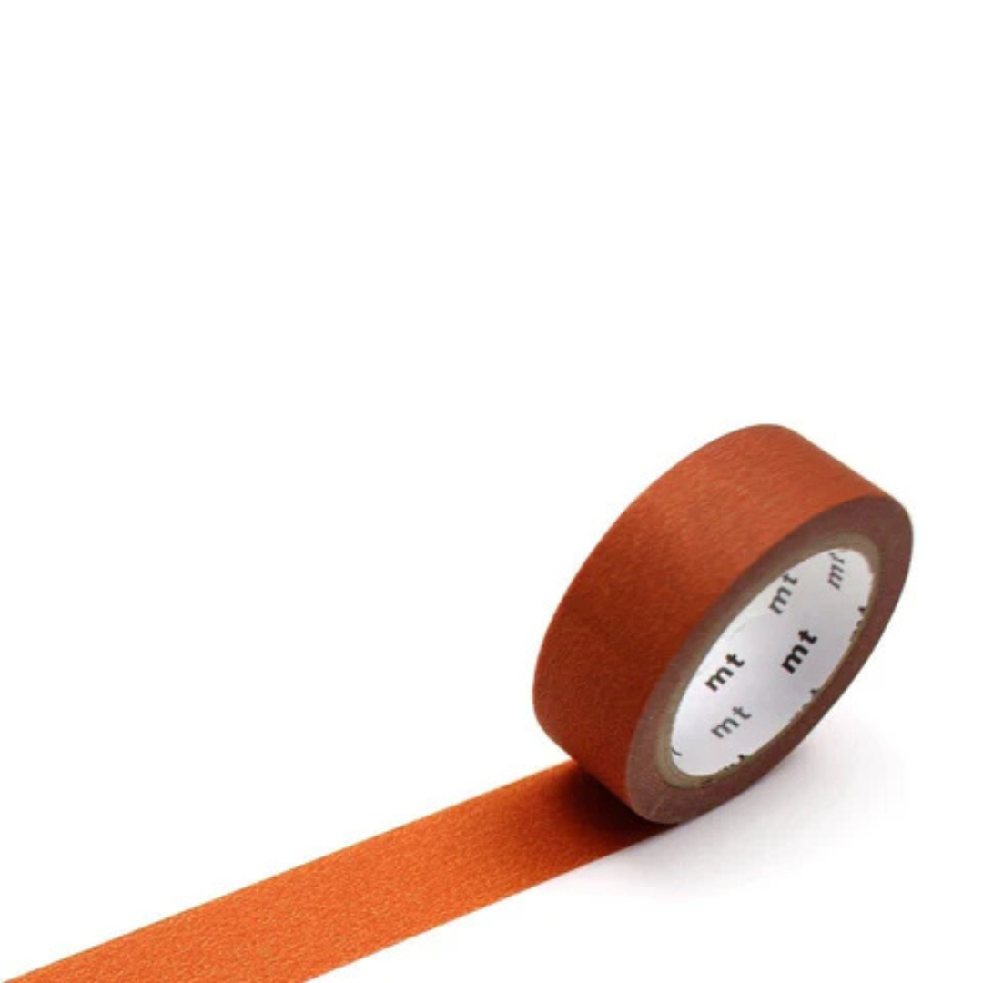 Single roll of matte burnt orange masking tape against a white background.