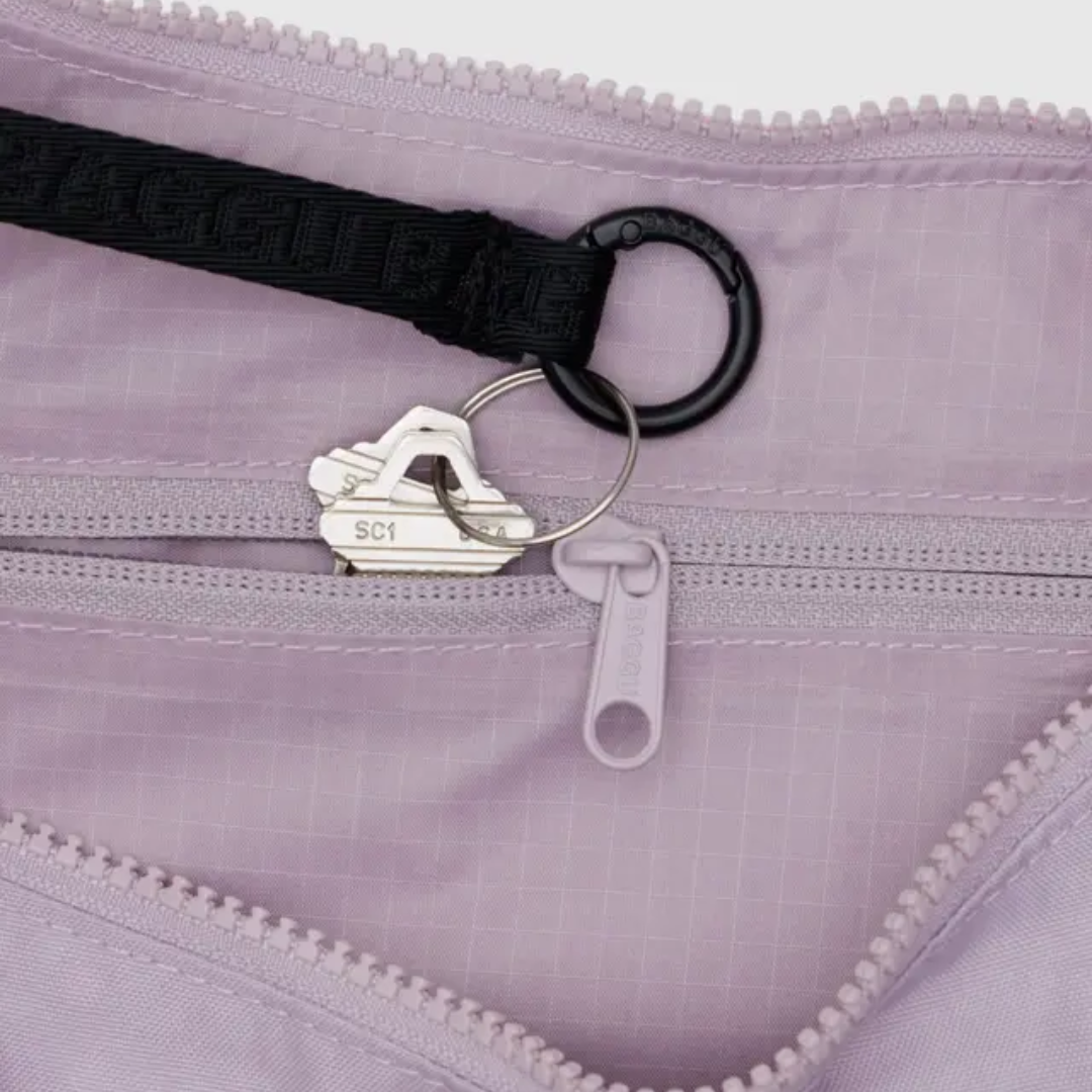 Internal key leash and zippered pocket