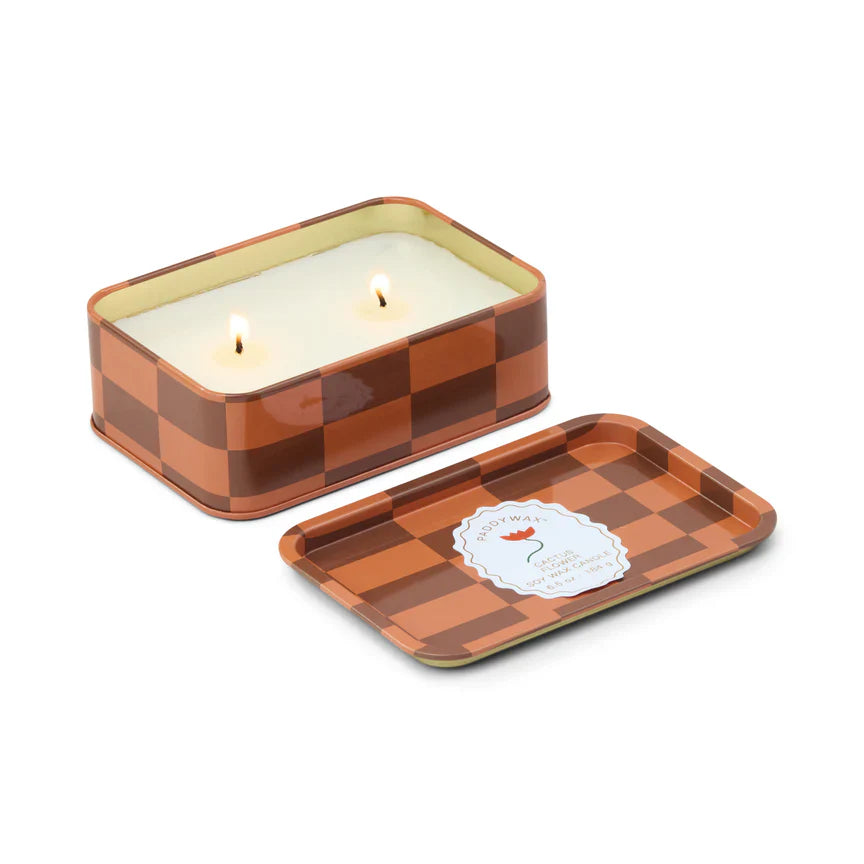 Open tin with 2 wick candle, lid comes fully off tin