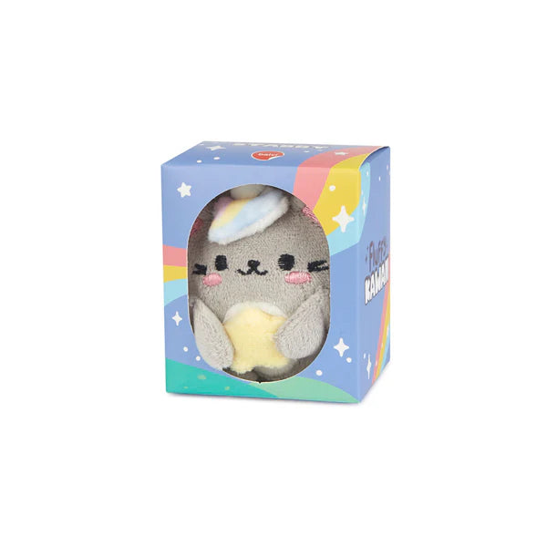 Starry in their box. Box is covered in colorful rainbows and stars and has a window for Starry