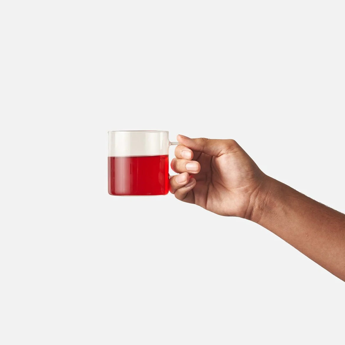 Hand holding a cup of tea