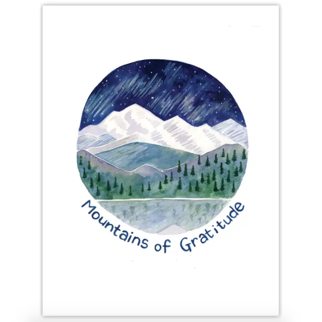 White card with circular design featuring a starry sky and mountains. Text reads "Mountains of Gratitude"