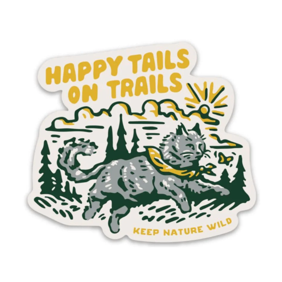 A gray cat in a yellow bandana chases a butterfly on a wild sunny day. Sticker reads "Happy tails on trails/Keep nature wild"