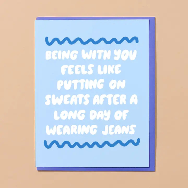 Card with blue border and white text on a beige background