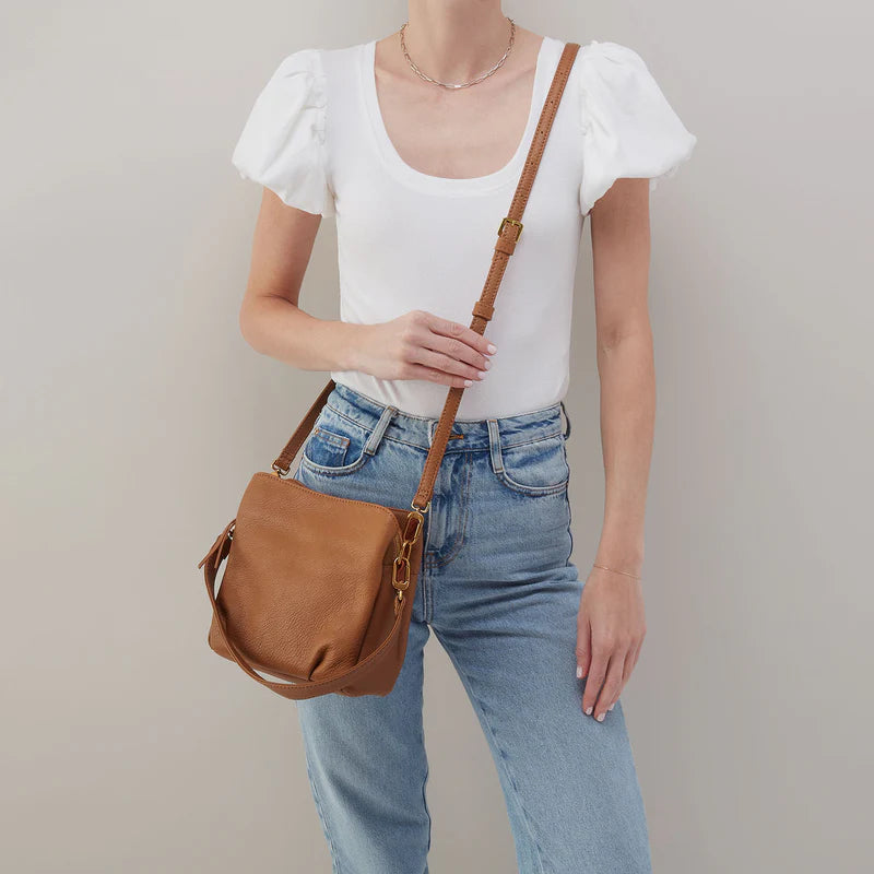 model using the crossbody strap