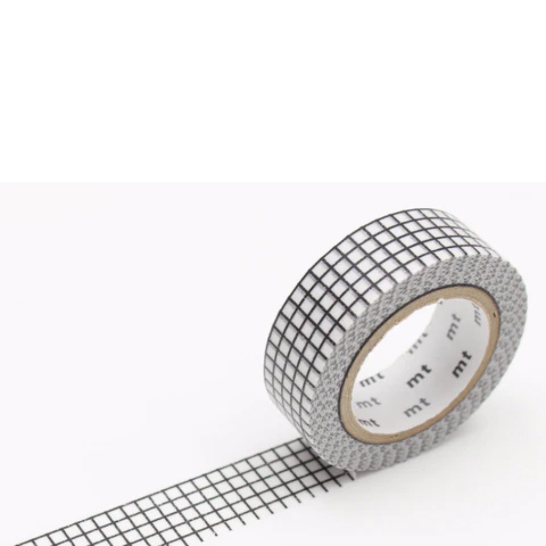 Black and white graph patterned roll of maskig tape.