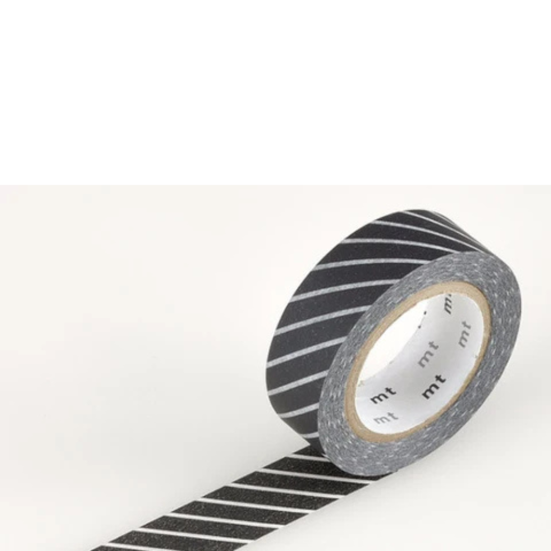 Black and white diagonal stripe patterned roll of masking tape against a white background.