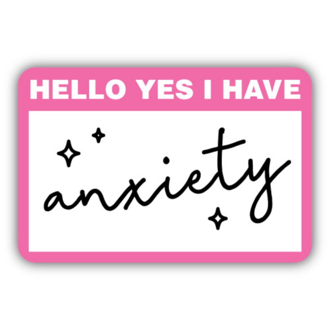Pink nametag sticker that reads "hello yes I have anxiety" with little black diamonds around it.