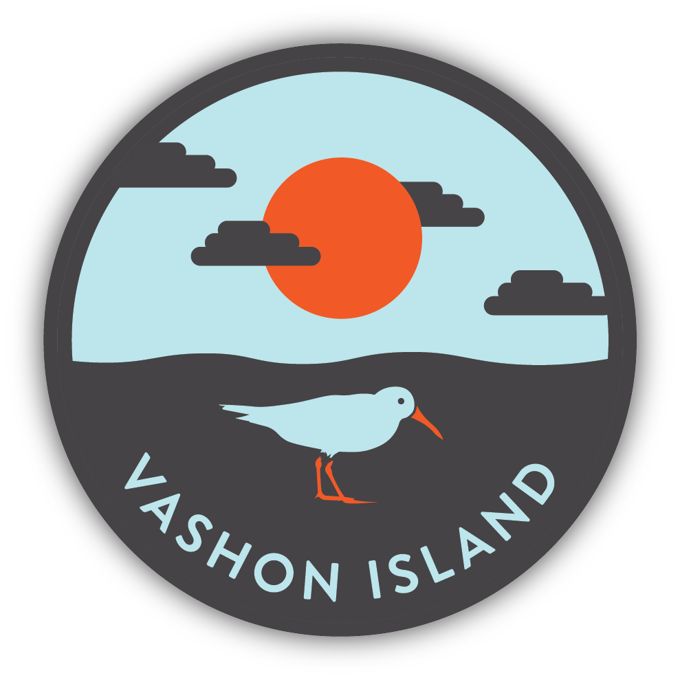 Circular sticker with a bird, sun, and clouds design, featuring 'Vashon Island'.