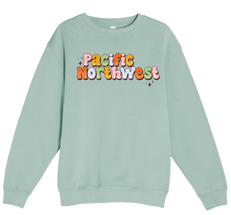 Light green sweatshirt with 'Pacific Northwest' text in colorful letters on a white background