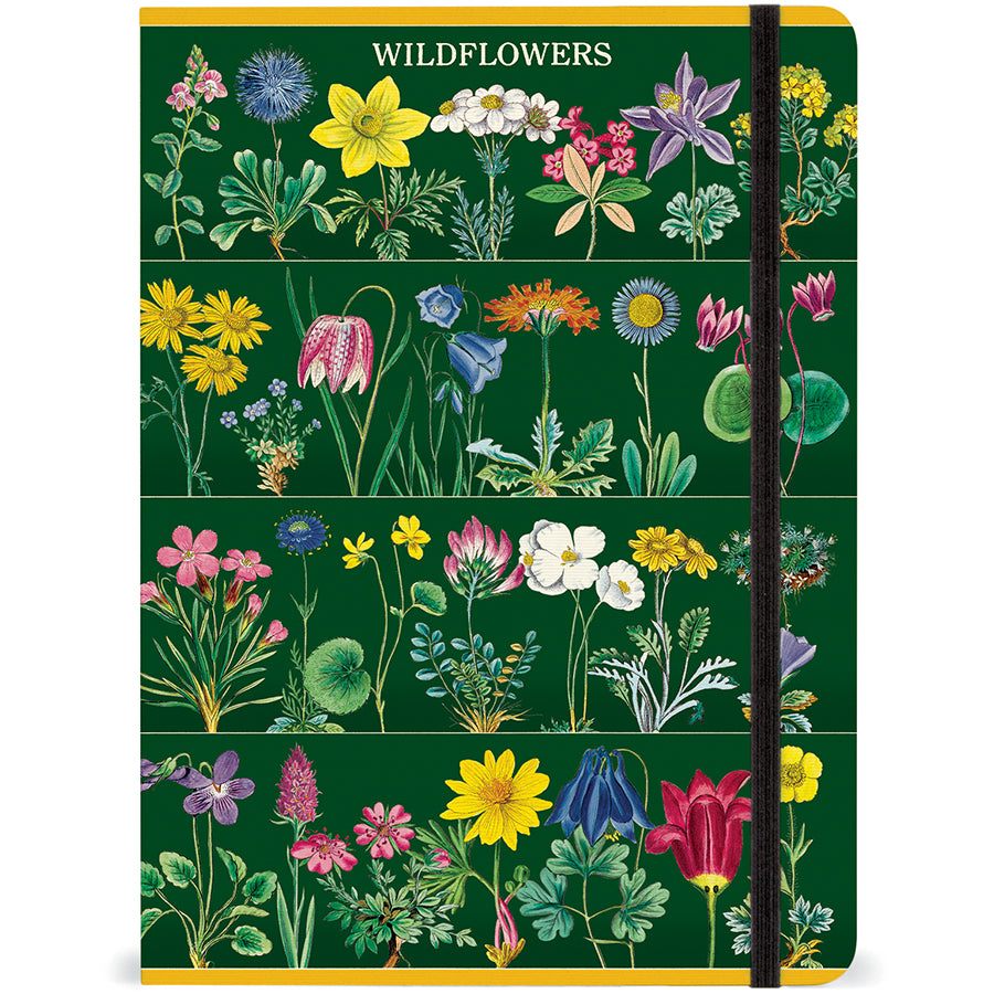 Notebook with wildflower design on a green background. Notebook has a black elastic closure.
