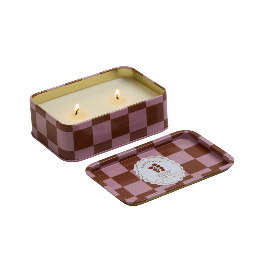 Open tin showing candle with wicks, lit. Lit is fully removable.