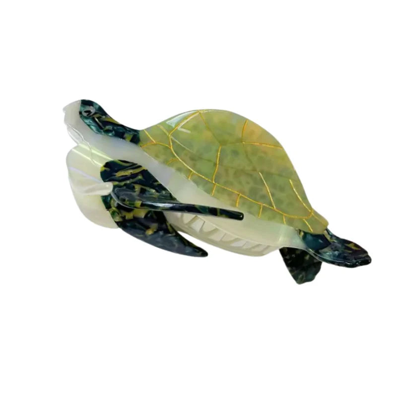 Green tortoiseshell-patterned turtle shaped claw hair clip
