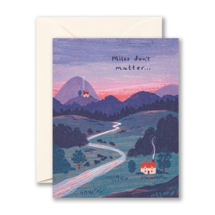Card with a landscape and two cozy homes one in the foreground and the other far in the background. Card reads "Miles don't matter..."