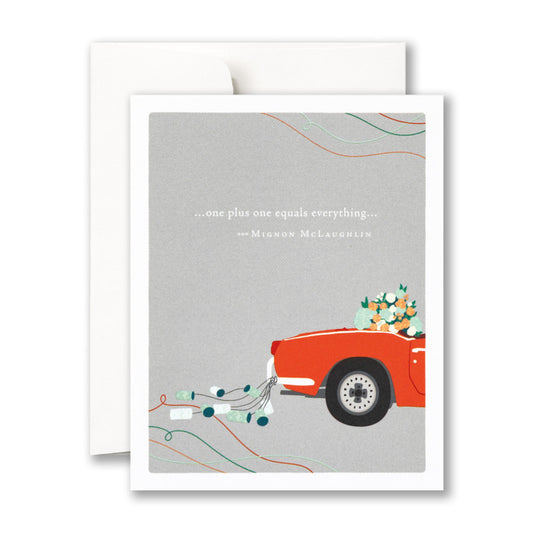 Card with the back of a car full of flowers with cans tied to the bumper against a gray background. Reads: "one plus one equals everything... - Mignon McLaughlin