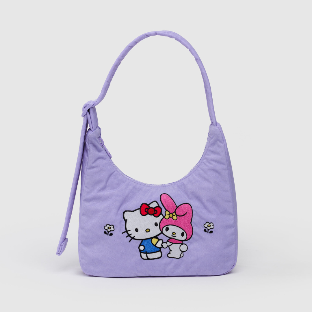 Small shoulder bag in light purple with an embroidered design featuring Hello Kitty and My Melody holding hands