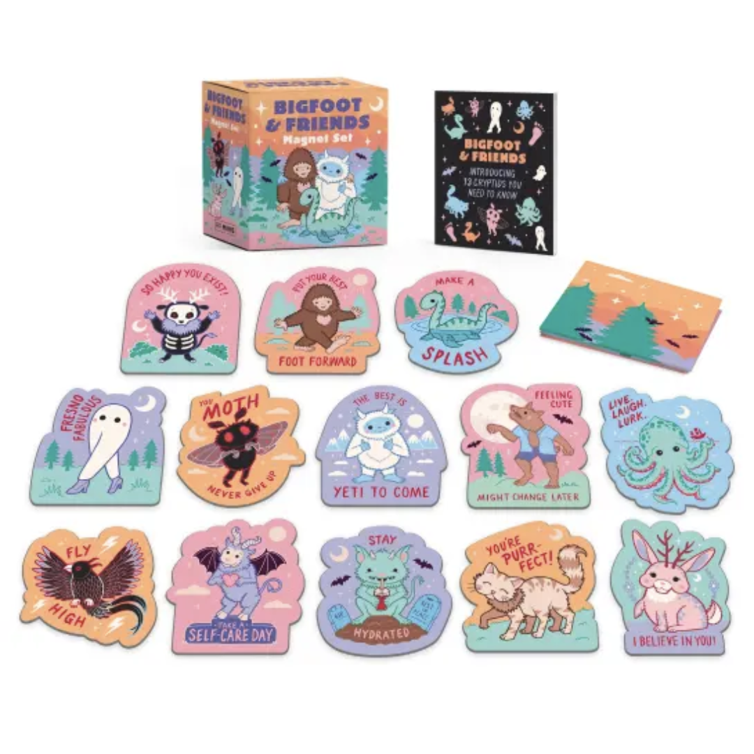 Set of colorful magnets featuring adorable illustrations of famous cryptids with inspirational quotes like "So happy you exist" and "Live. Laugh. Lurk."
There are 13 magnets, a folded backdrop, info booklet, and presentational box.