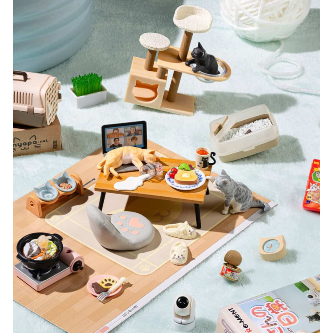 Life with Cat miniatures posed with each other featuring a cat in a cat tree, a cat ruining a Zoom meeting and a cat stealing a lunch