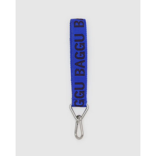 Bright blue lanyard featuring the word "BAGGU" in a darker blue font and a silver keychain and carabiner attached. 