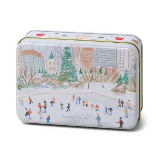 Holiday tin featuring design of people ice skating in the middle of the city.