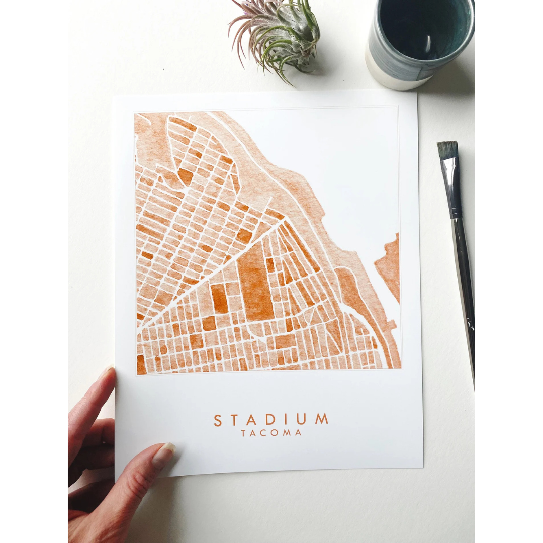 Tacoma neighborhood map print of the stadium district in warm red featuring the words "STADIUM TACOMA" underneath it.