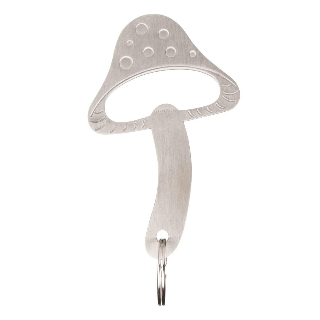 Silver metal mushroom shaped bottle opener on silver key ring against white background.