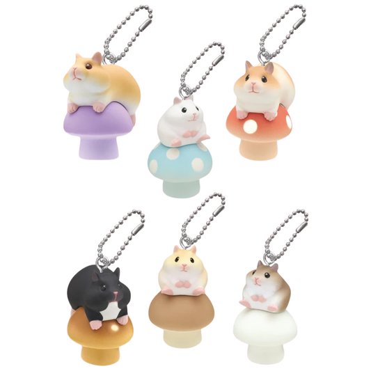The possible options in the blind box, all hamsters, all freaking adorable, all sitting on mushrooms - a purple mushroom. light blue with polkadots, red with polkadots, golden yellow, brown, and white