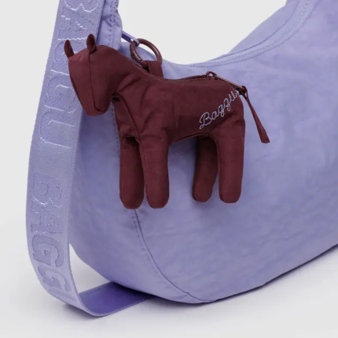 Horse pouch clipped onto a Baggu bag