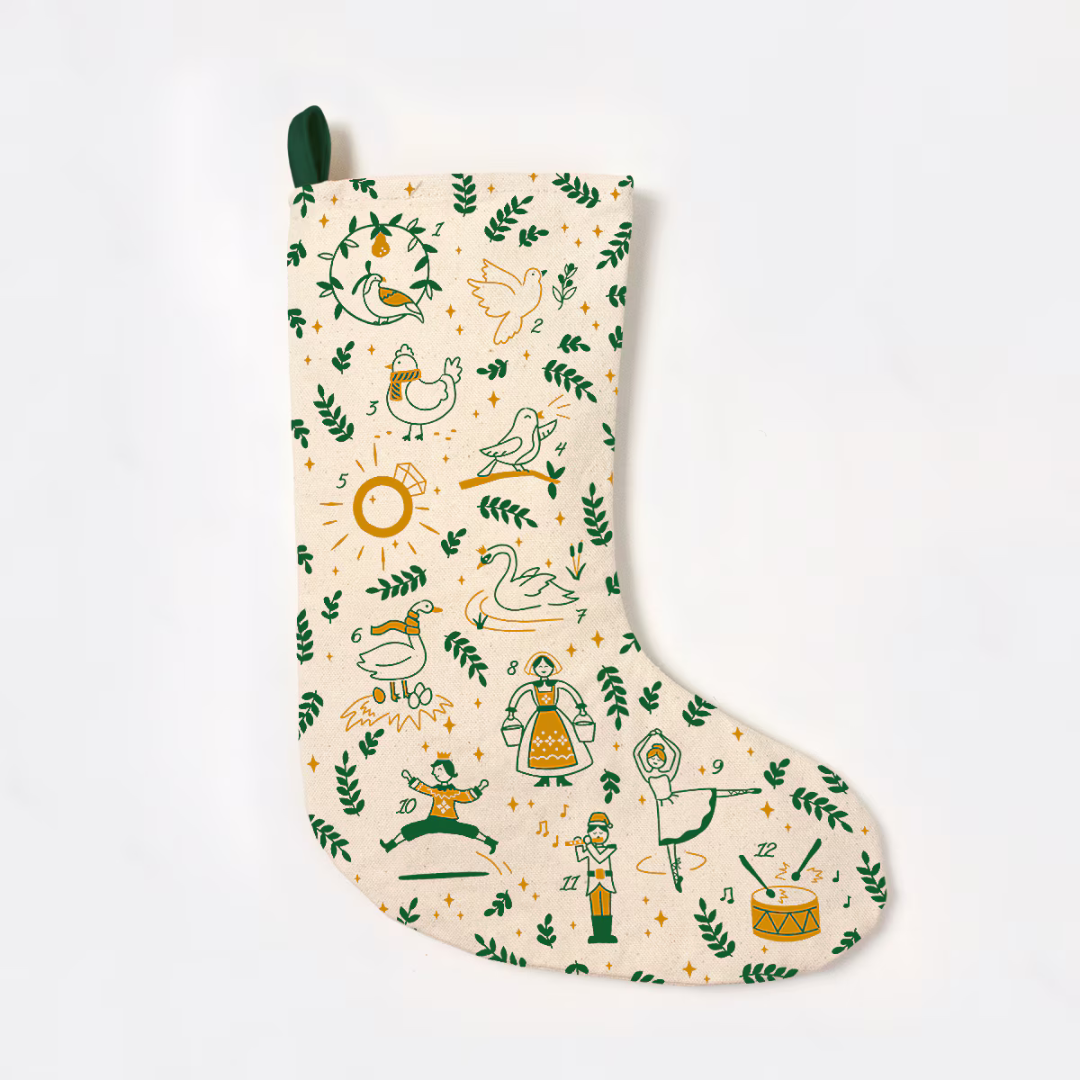 Creamy off-white stocking with a green hook to hang, featuring a green and gold pattern of each of the twelve days of Christmas items and green stems to match.