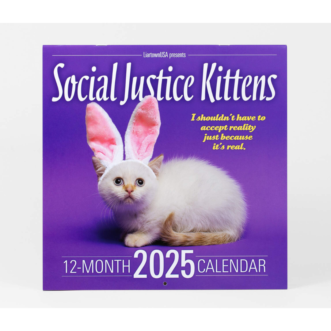 Front cover of Social Justice Kittens 2025 calendar featuring a purple background and a white kitten on the front wearing pink bunny ears and white and yellow script.