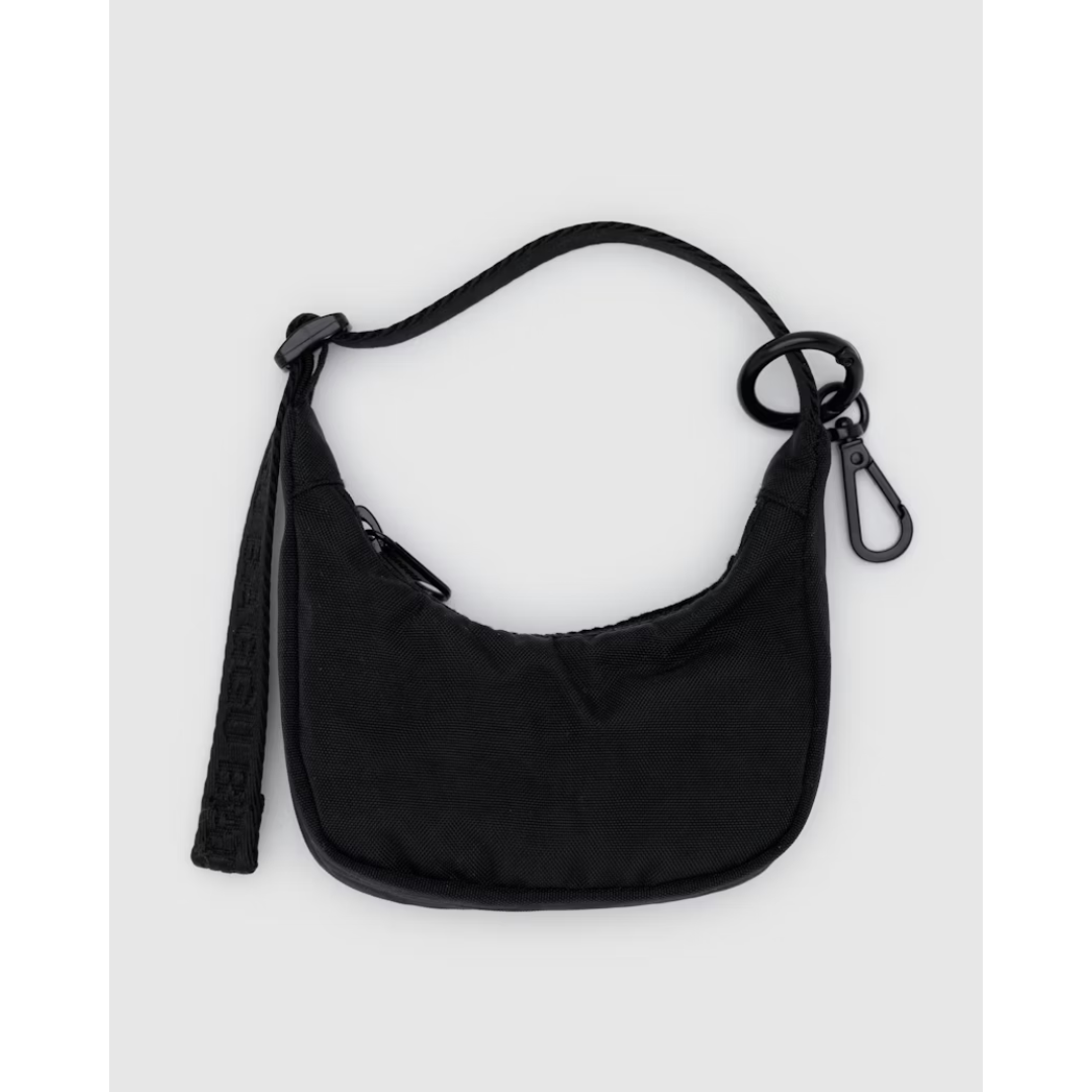 Black nylon crescent shaped bag charm to attach to your bag.