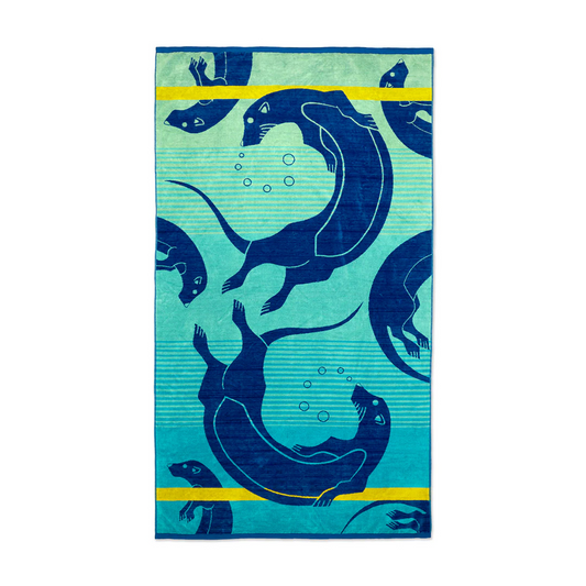 Green and blue hued beach towel featuring print of otters swimming and yellow striping.