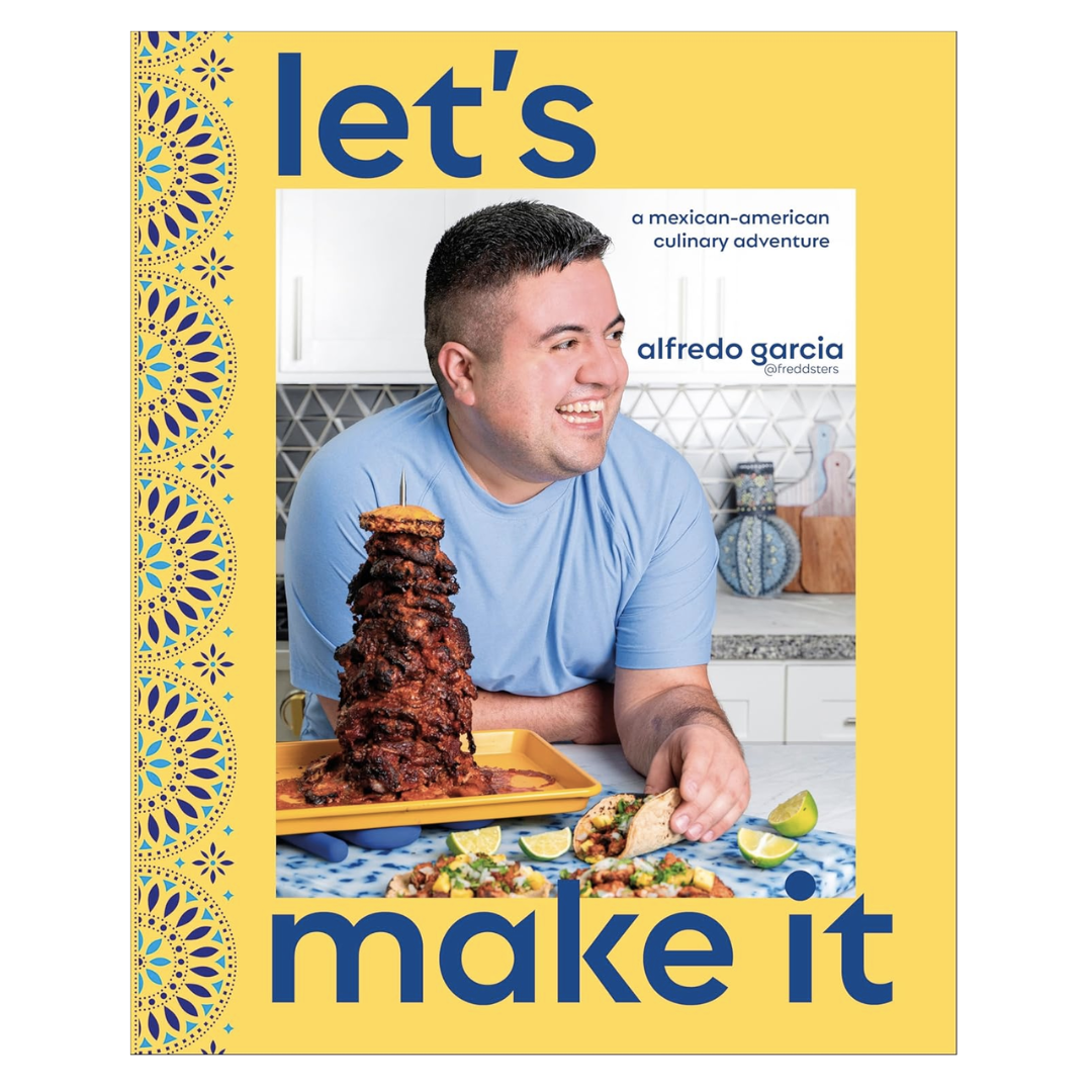 Cover for "Let's Make it" is yellow and blue and features the author smiling with a tower of meat al pastor  and tacos in a white and blue kitchen