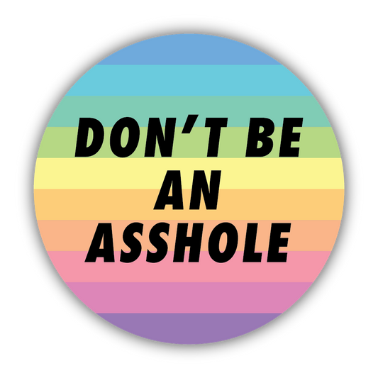 Round sticker with rainbow stripes and text 'DON'T BE AN ASSHOLE'