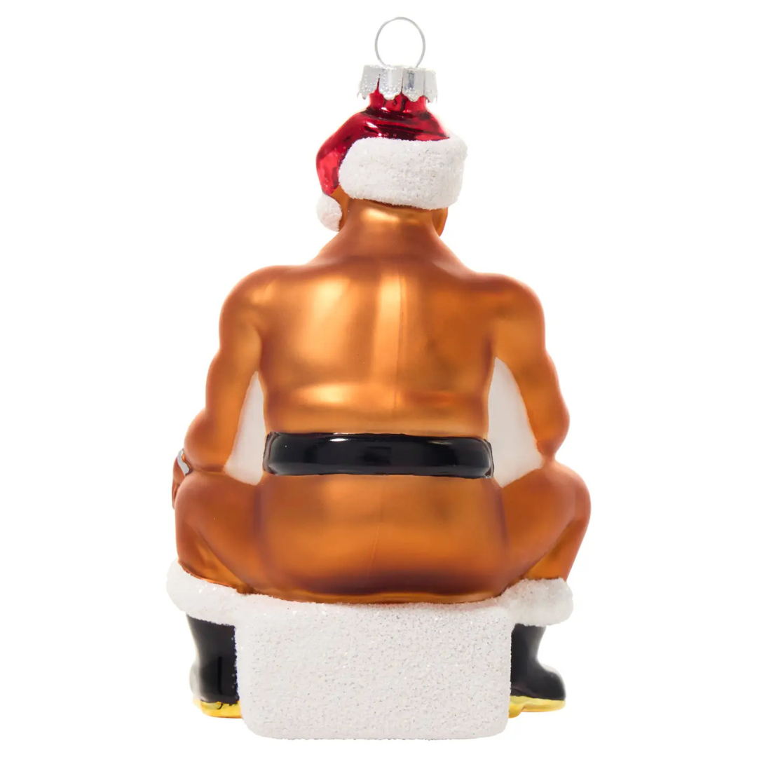 Ornament of naked black man wearing only a black belt, Santa hat and black boots.