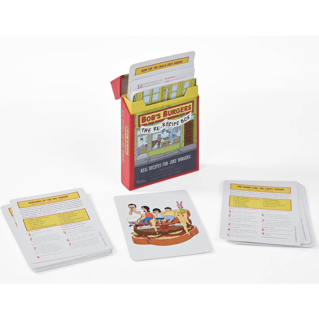 The box open with the recipe cards displayed. Cards have art from the show on one side and recipes and tips on the other