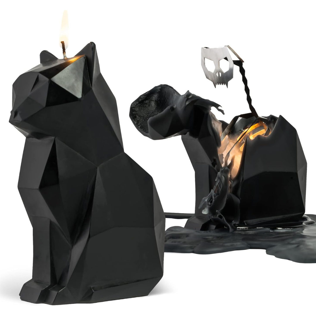 Black cat shaped candle shown in two different burn stages: first lit and halfway burned.