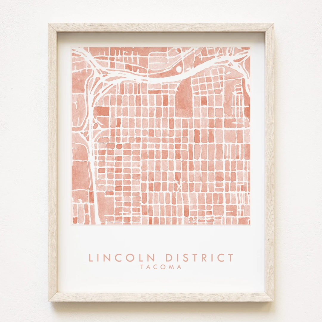 Tacoma neighborhood map featuring the Lincoln District in a salmon color and the words "LINCOLN DISRICT TACOMA" underneath.